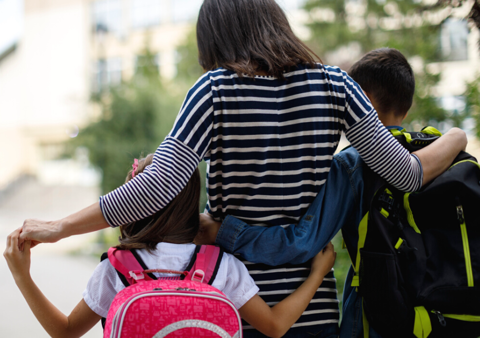Pathways Image mother with arms around children Mother with arms around children.